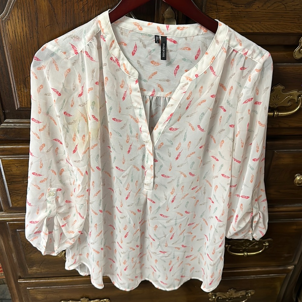 Feathered tunic